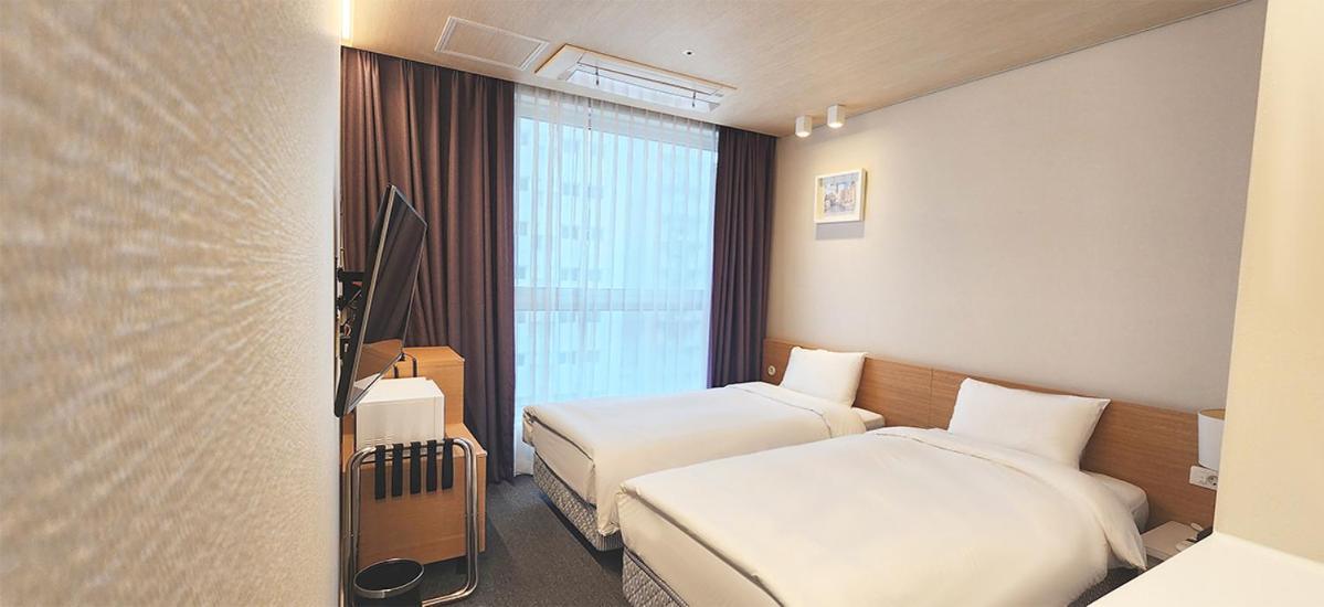 Grand City Hotel تَنوان المظهر الخارجي الصورة