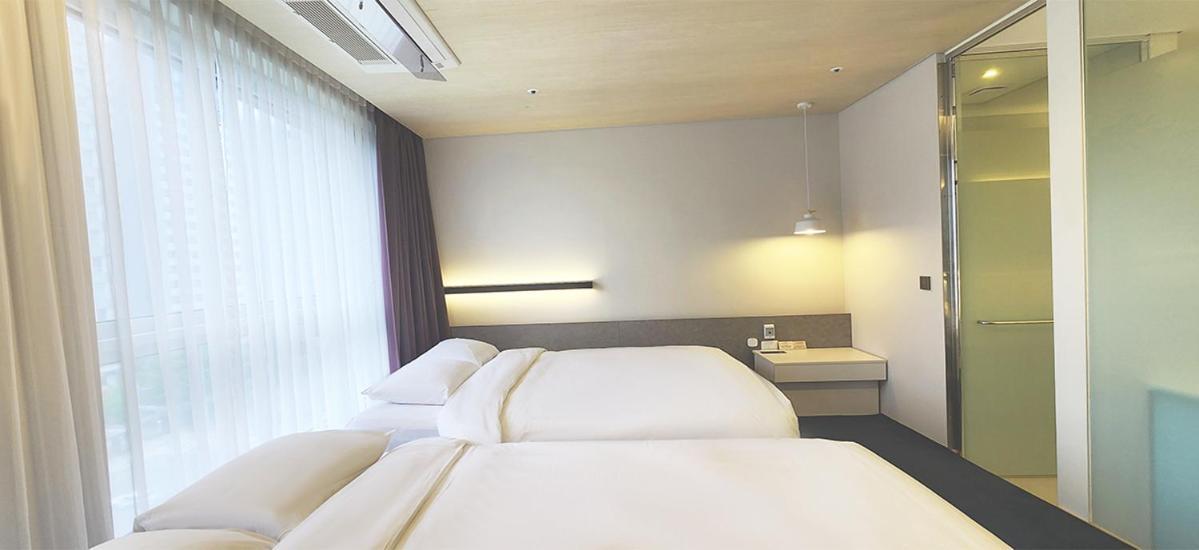 Grand City Hotel تَنوان المظهر الخارجي الصورة