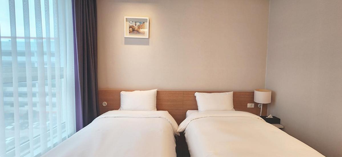 Grand City Hotel تَنوان المظهر الخارجي الصورة