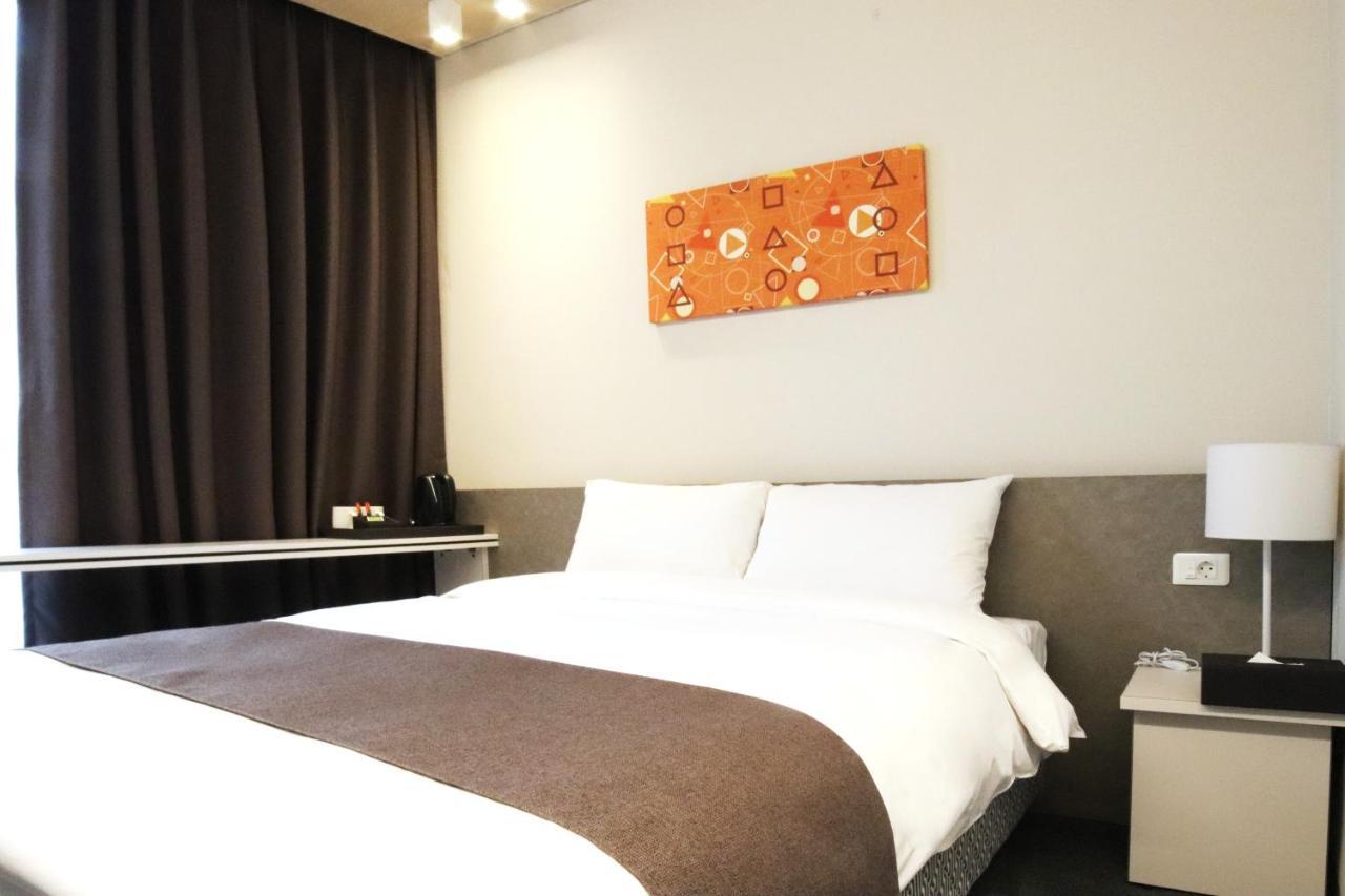 Grand City Hotel تَنوان المظهر الخارجي الصورة